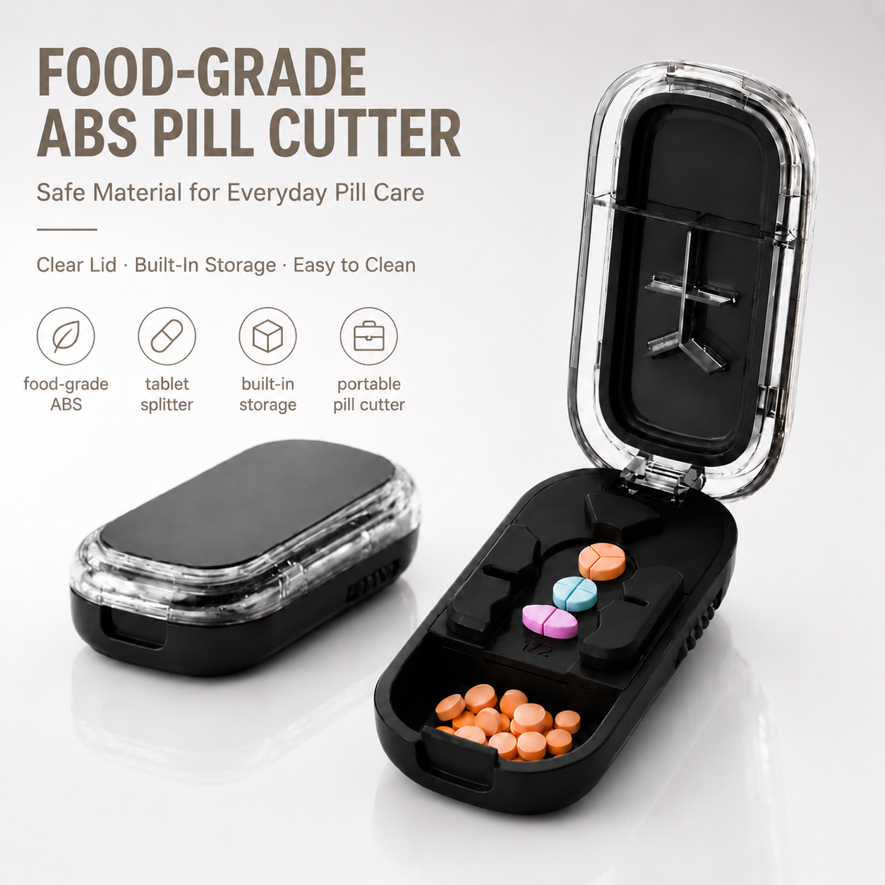 Black ABS pill cutter with clear protective lid, built-in storage, and compact portable daily pill care design