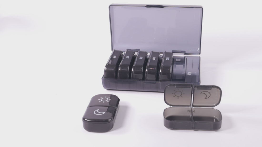 UNTIOR 14-compartment weekly pill organizer product demo showing 7 removable AM/PM daily cases, smoky protective cover, single central latch, and compact travel-friendly daily carry design.