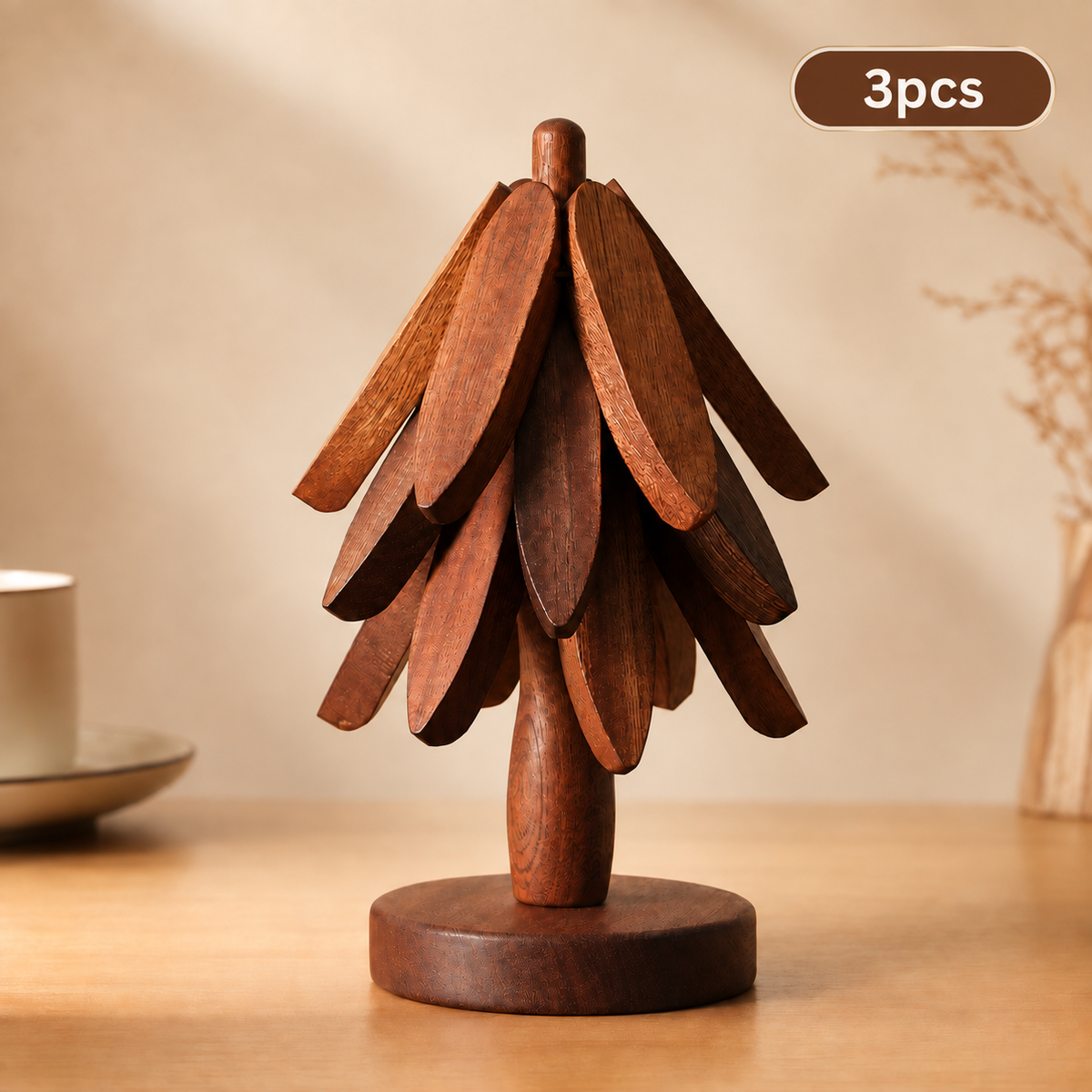 UNTIOR 3-piece wooden tree-shaped coaster set in walnut color, with layered leaf-shaped coasters and a round wooden holder on a warm wooden table.